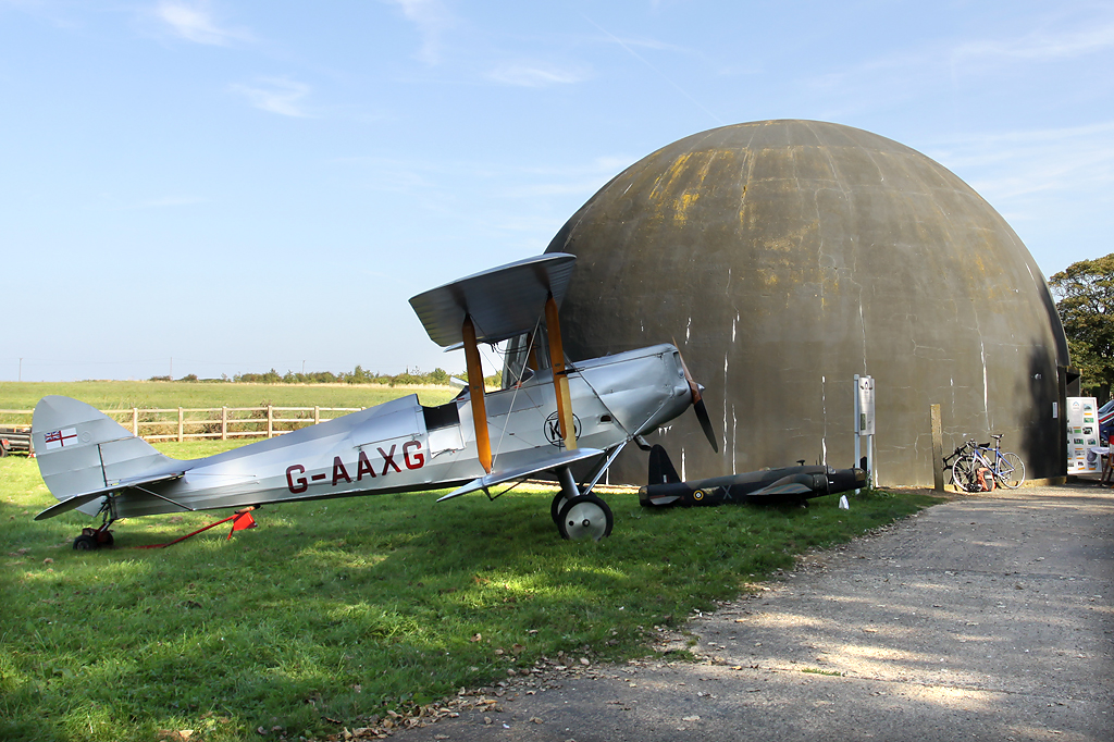 The Dome behind a De Havilland DH-60M Moth aircraft  © John Allan